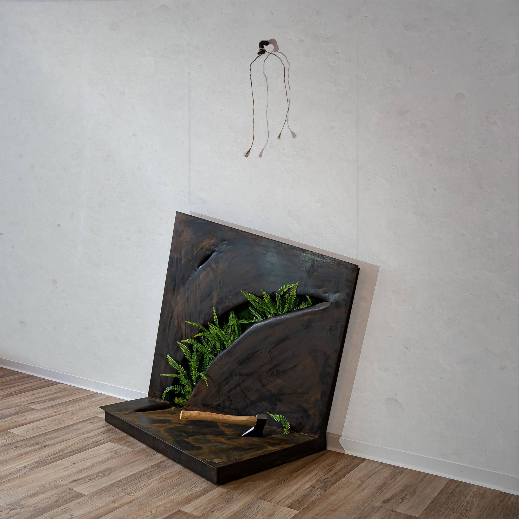 Wohnzimmer Deko – Stahl Skulptur bzw. aus Metall mit dem Namen „Knick" aus der Reihe Schnitt von Daniel Springer.